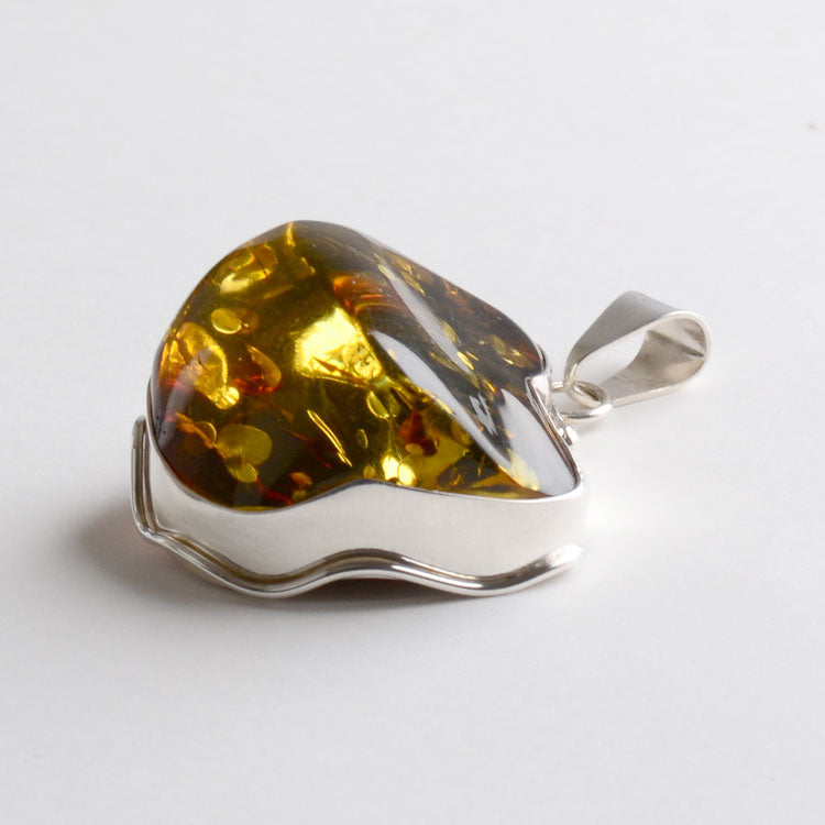 Large Chunk of Green Amber Pendant