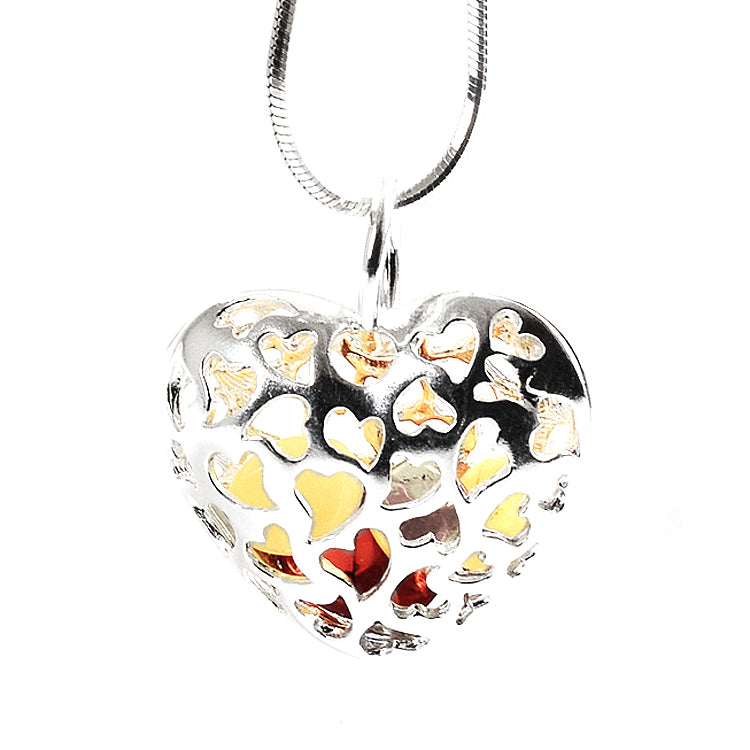 Amber Pieces in a Heart Pendant