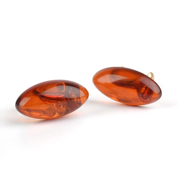 Sleek Amber Oval Clip On Earrings