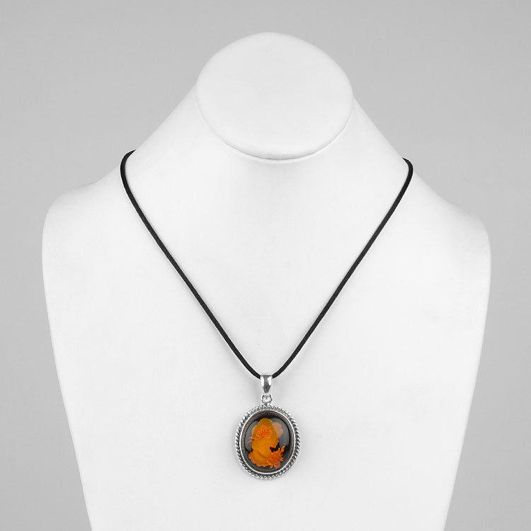 Intaglio Amber Profile Pendant