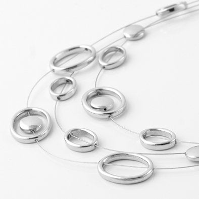 Loops Silver Floating Necklace and Earrings Set