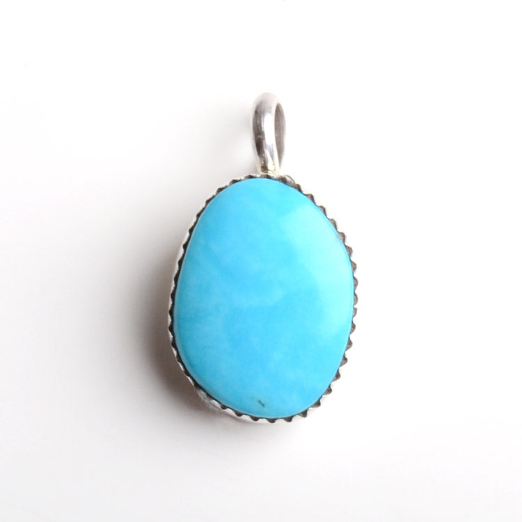 Little Turquoise Stone in Silver Pendant