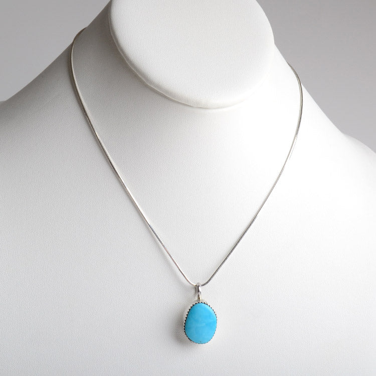 Little Turquoise Stone in Silver Pendant