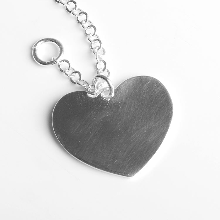 Dangling Silver Heart Bracelet