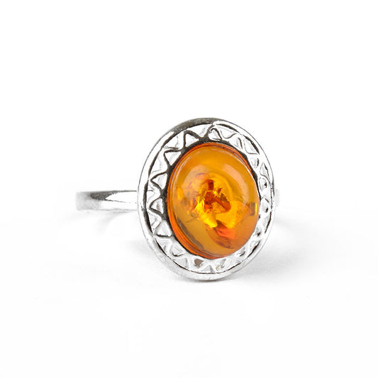 Amber Oval with Stylized Silver Ring