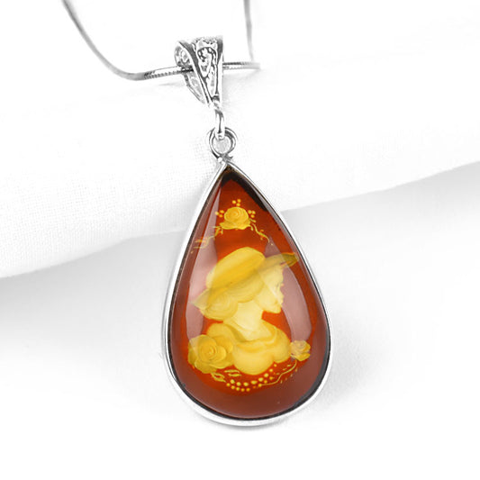 Carved Amber Portrait Pendant