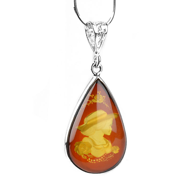 Carved Amber Portrait Pendant