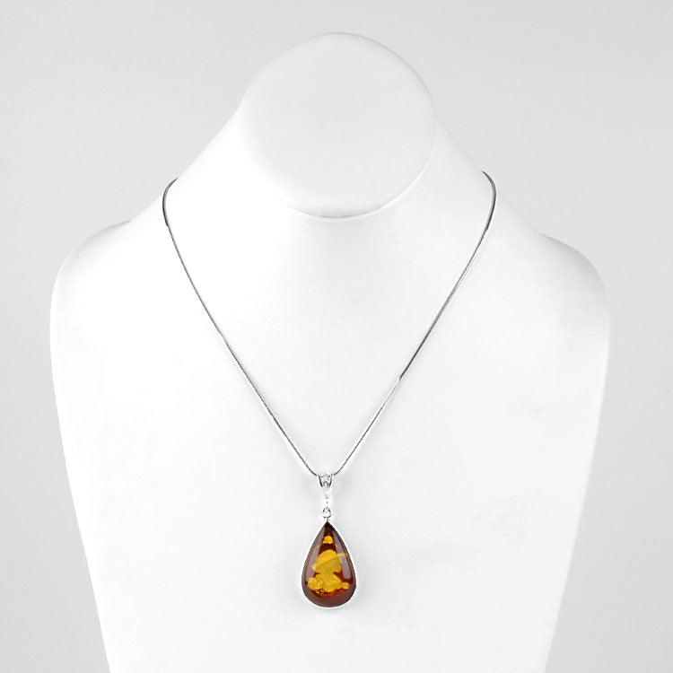 Carved Amber Portrait Pendant
